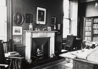 Interior, view of fireplace in drawing room.