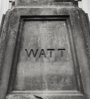 Detail of inscription reading "Watt" on pedestal.