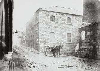 General view of North College Street showing Gaelic Church at junction with College Wynd, Edinburgh prior to demolition.
Copied from original in NMRS Collection by Archibald Burns 1871 from the W and R Chalmers Collection