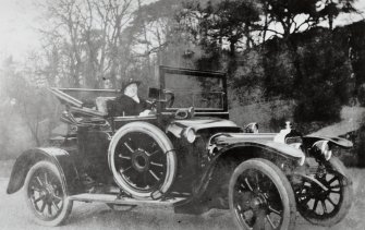 Edinburgh, Clermiston Road, Clerwood House.
View of motor vehicle and driver in grounds.