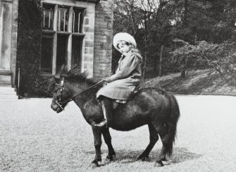 Edinburgh, Clermiston Road, Clerwood House.
View of South front with pony and child.
