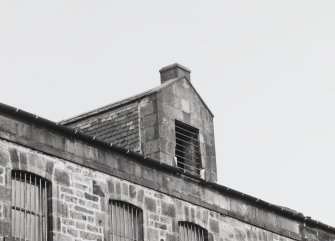 Detail of hoist tower on South West frontage of block 6 in the Warehouse range.