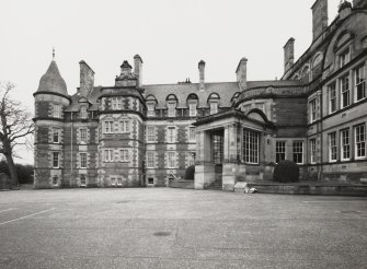 General view of North facade and portico of Craig House from North.
