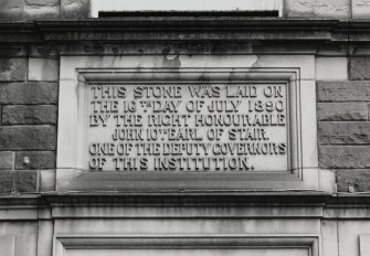 Detail of commemorative date panel at Craig House, reading "This stone was laid on the 16th day of July 1890 by the Right Honourable John 10th Earl of Stair, one of the deputy governors of this institution."