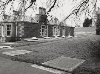 General view of rear of East Craig showing glass grilles of underground corridor leading to Craig House.