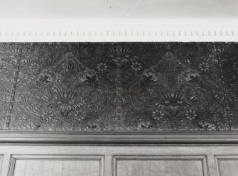 Interior, detail of embossed frieze in entrance hall of Craig House.