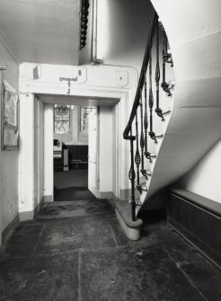 Interior-view from North of chapel doorway from hallway, showing roll moulded doorpiece.