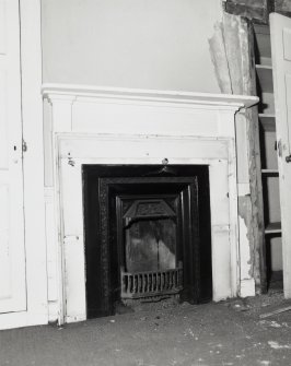 Interior-detail of fireplace in East upper room showing c1820 reeded woodwork.