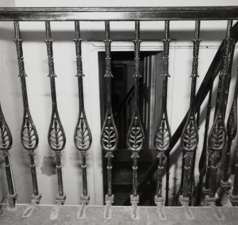 Interior-detail of cast iron railings on First Floor landing.