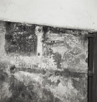 Interior-detail of blocked window in North wall to West of main door.