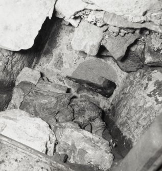 Interior-detail of window remains above door opening on First Floor of West wall of tower.