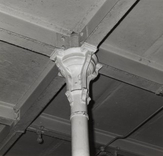 Interior-detail of cast-iron column and ceiling on First Floor of Tun Room