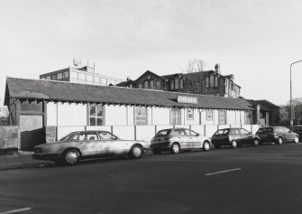 View from NW of road level ticket office.