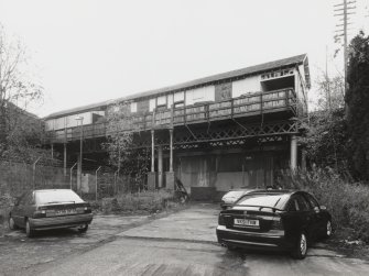 View from ENE of road level ticket office from trackbed.