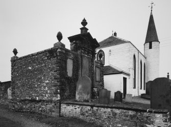 View of burial vault and church from W.