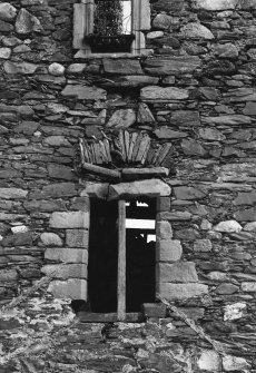 First floor window wth chamfered quoins, NW wall