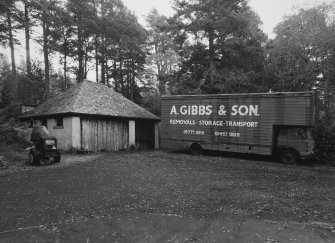 View of E garage from NW including 'marooned' removal van