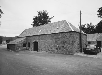 Exterior view from SE of mill.  The conical kiln vent was removed in 1968, and the building has recently been renovated (1996).  There is a marriage lintel situated above the door dated 1696, with the initials RB and KD