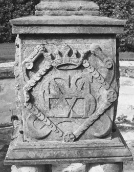 East fountain, one face of plinth, intertwined letters (MGS) encircled by wreaths and surmounted by a crown, detail