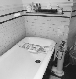 Interior.
Detail of first floor bathroom showing bath and taps.