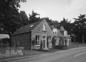 View of cottage and former shop at Bridgend to East of West Lodge from SW.