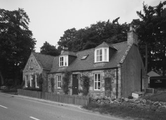 View of cottage and former shop at Bridgend to East of West Lodge from SE.
