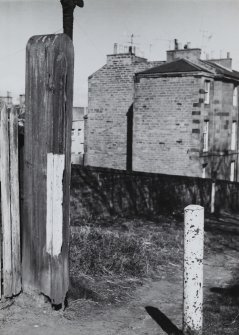 Newhaven Station.
View of pipe and cement post blocking path to former station, with one of former gate posts.