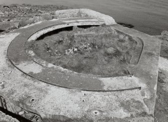 Edinburgh, Cramond Island, Cramond Battery, coast battery. View from south of remains of the gun emplacement (canopy removed).  Visible holes for the canopy support and an area of reconstruction to the carapace.