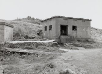 Edinburgh, Cramond Island, Cramond Battery, coast battery. View of gun battery engine house from North East showing entrance with steps, ventilators and steel window shutters.