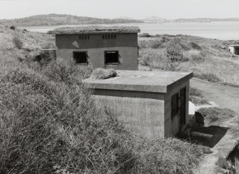 Edinburgh, Cramond Island, Cramond Battery, coast battery. View of gun battery engine house and magazine from the East.  Visible are ventilators and steel framed windows.