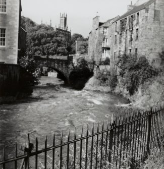 General view downstream towards Water of Leith Bridge and Holy Trinity Church also showing 12 Hawthornbank Lane and 17 Bell's Brae