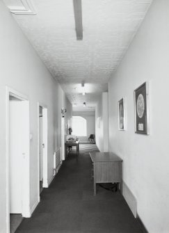 Interior. View of second floor East/West corridor from West