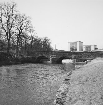 View of bridge from E, with distillery in background