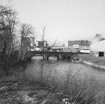 View of bridge from SE, with distillery in background