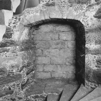 Interior - steeple, second landing, south wall, detail of blocked embrasure