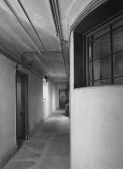 Basement, West passage way, view from South
