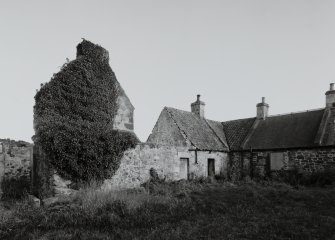 Broadwoodside Farm.
View of cottages and remains of gable and ingleneuk from NW.