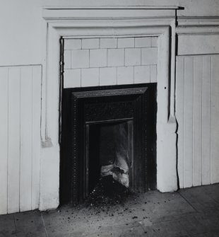 Interior.
Detail showing fireplace in E room, basement.