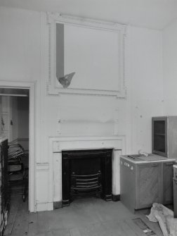 Interior.
View of first floor N central room from W.