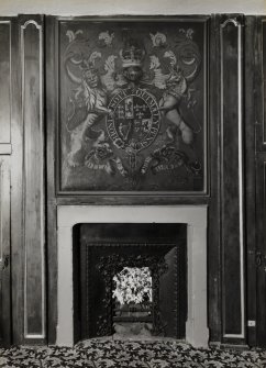 Interior - council chamber, east wall, detail of fireplace with hanoverian heraldic plaque