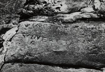 Detail of inscribed slab.