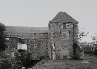View of Gimmers Mill from NNW, with two kilns (right) and two arches over the tailrace.