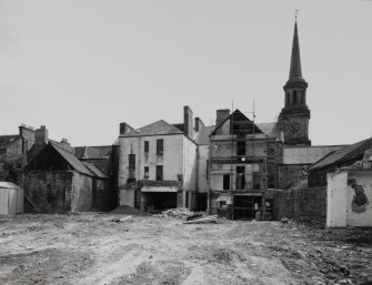 View from north of rear of 42-48 Market Street with Town House steeple in background.