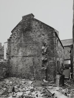 View of outhouses to rear from NE.