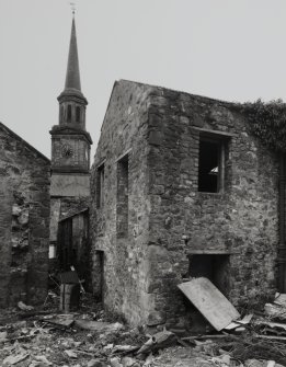 View of outhouses to rear from N.