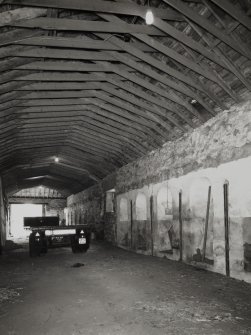 Interior view from NW within stables (gutted).