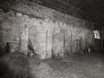 Interior view of E end of stables, showing alcoves (plaster removed from walls).