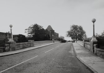 General view along bridge at deck level from WSW, also showing lamp standards.