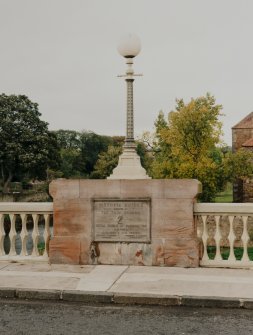 Detail of lamp standard and commemorative plaque.