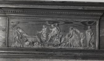 Interior.
Detail of carving above S wall fireplace.